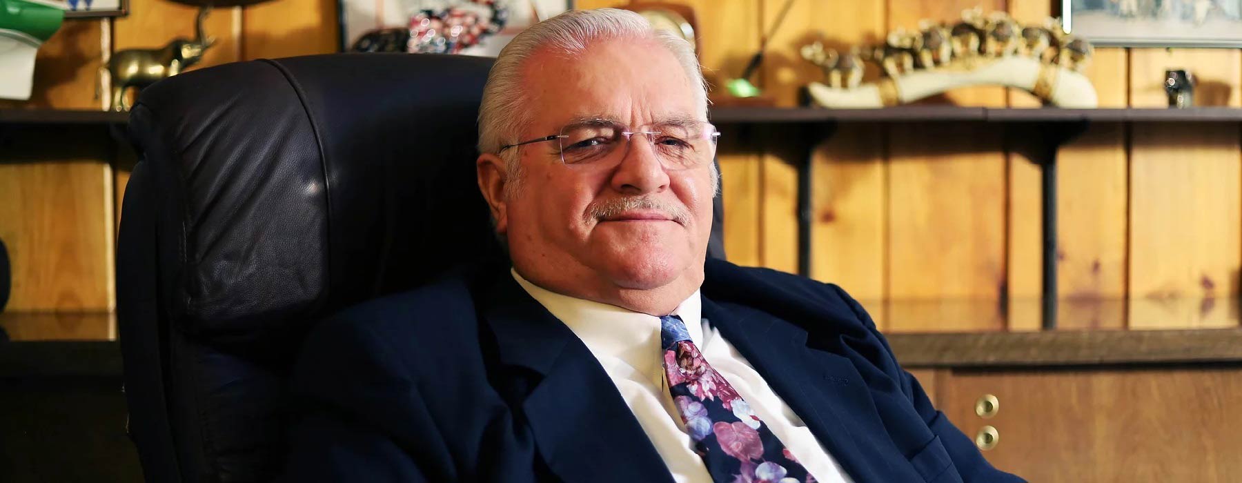 Business man under an umbrella